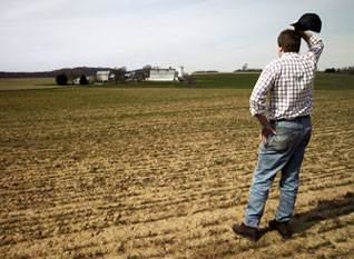 Farmer holding seeds